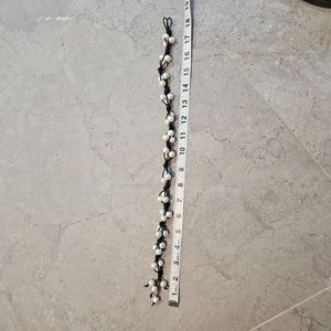 Black leather and  pearl necklace